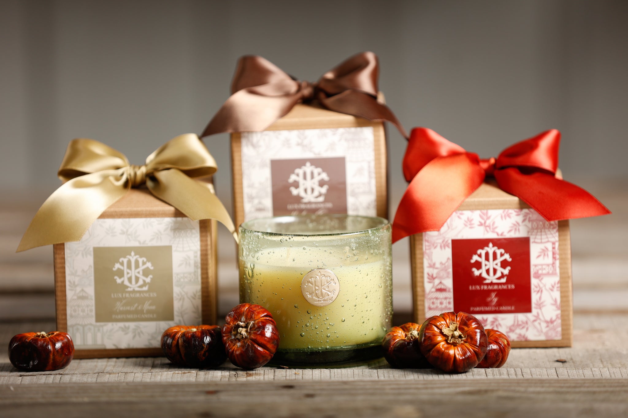 Harvest Moon 13 oz Candle in Green Glass with Bow MIN 6