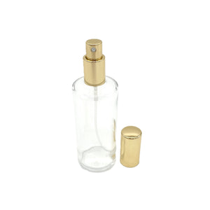 4OZ BOSTON ROUND CLEAR BOTTLE WITH GOLD PUMP